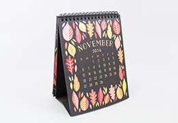 Prop up your cookbook or calendar with a built-in easel stand.